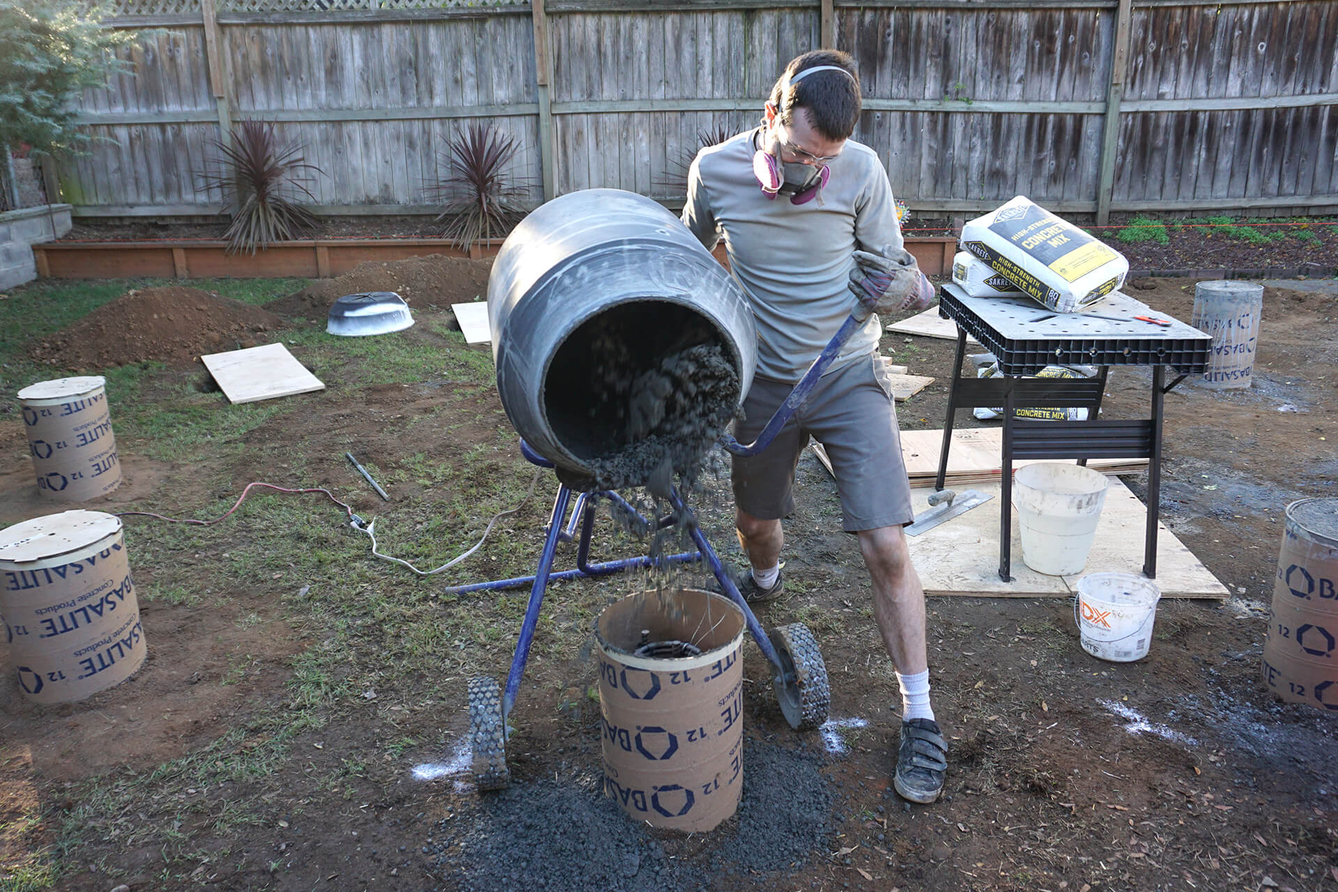 Pouring concrete for the foundation.