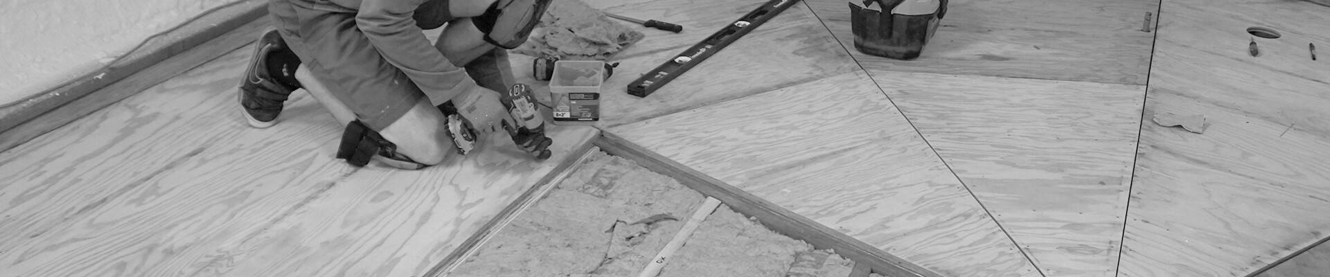 A close-up view of the subfloor being installed in the Mini Dome.