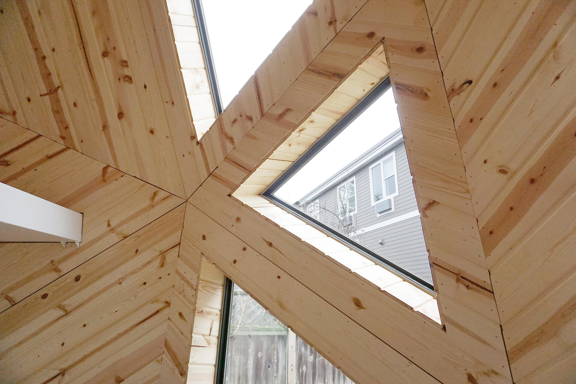 The mini dome walls with wood paneling.